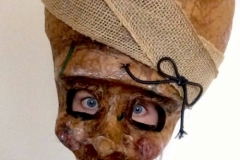 Big-Brained Lady mask by Alexandra Simpson.